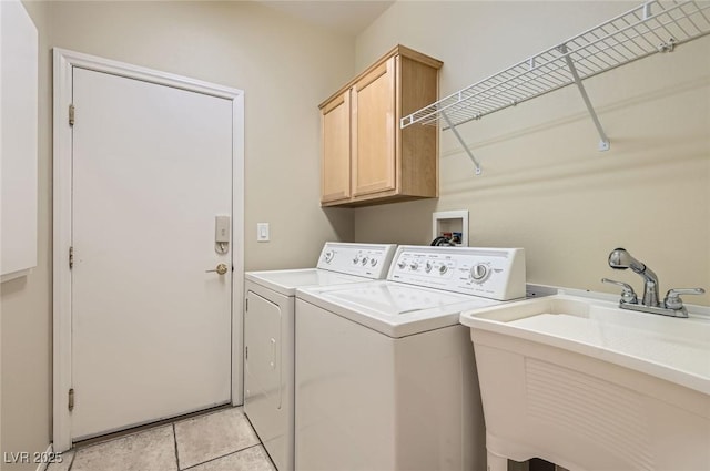 10212 Donald Weese Ct, Las Vegas, NV 89129 - washroom with washing machine and dryer, cabinet space, and light tile patterned floors