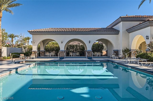 10212 Donald Weese Ct, Las Vegas, NV 89129 - community pool featuring a patio area