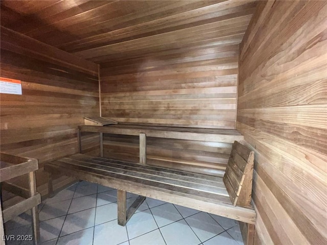 10212 Donald Weese Ct, Las Vegas, NV 89129 - relaxing sauna with wooden walls, wood ceiling, and tile patterned floors