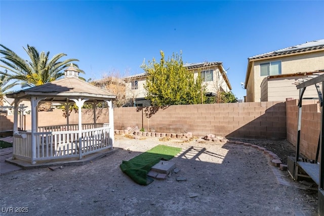 3774 Dusky Flycatcher St, Las Vegas, NV 89122 - fenced backyard with a gazebo