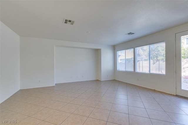 3774 Dusky Flycatcher St, Las Vegas, NV 89122 - unfurnished room with plenty of natural light and light tile patterned flooring
