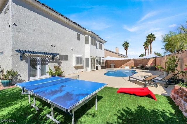 view of pool with a pergola and a patio