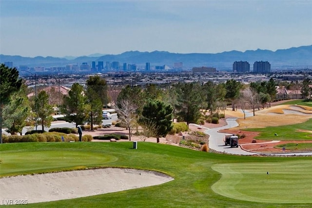 9552 Gold Bank Dr, Las Vegas, NV 89134 - view of home's community with view of golf course, a view of city, and a mountain view