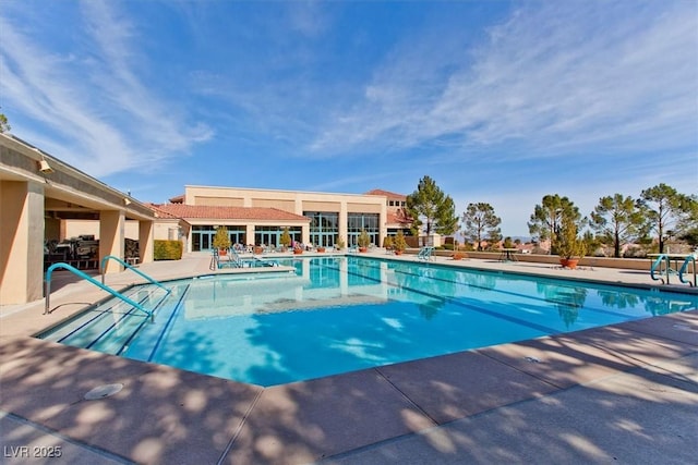 9552 Gold Bank Dr, Las Vegas, NV 89134 - community pool with a patio area