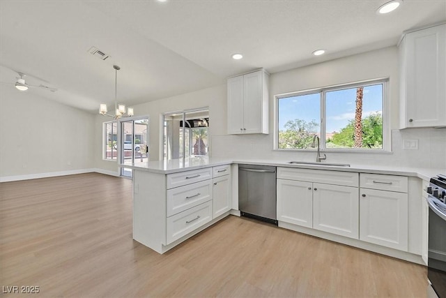 9552 Gold Bank Dr, Las Vegas, NV 89134 - kitchen with dishwasher, light wood-style floors, a peninsula, white cabinets, and recessed lighting