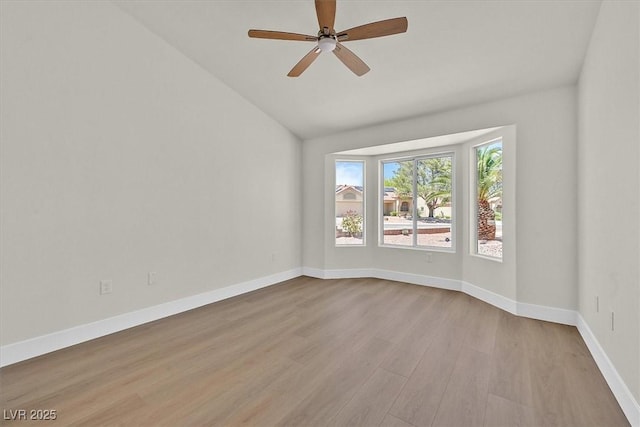 9552 Gold Bank Dr, Las Vegas, NV 89134 - empty room with vaulted ceiling, wood finished floors, and a ceiling fan