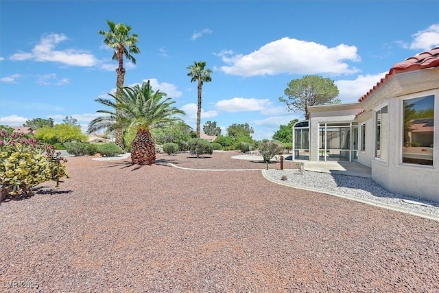 9552 Gold Bank Dr, Las Vegas, NV 89134 - view of yard with a sunroom
