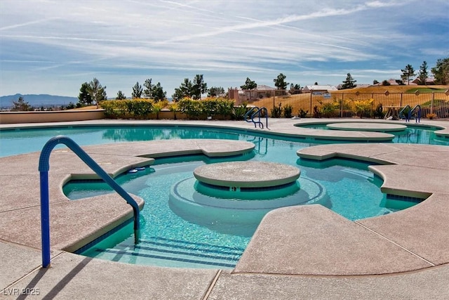9552 Gold Bank Dr, Las Vegas, NV 89134 - community pool with an in-ground hot tub and a patio