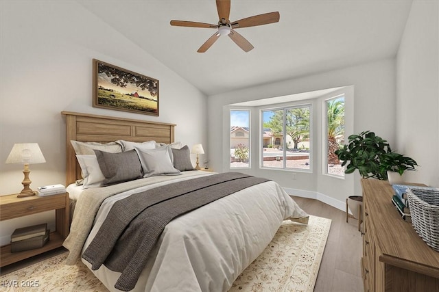 9552 Gold Bank Dr, Las Vegas, NV 89134 - bedroom with wood finished floors, vaulted ceiling, and ceiling fan