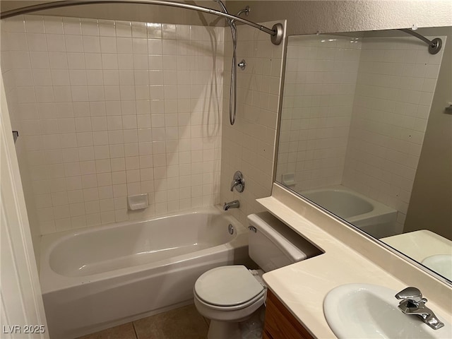 full bath with toilet, tile patterned flooring, tub / shower combination, and vanity