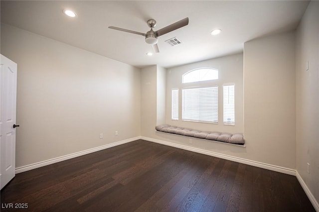 empty room featuring ceiling fan, wood finished floors, baseboards, and recessed lighting