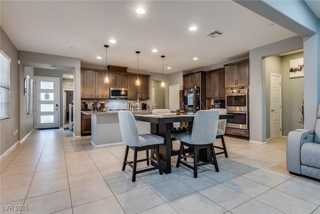 253 Kindly Way, Henderson, NV 89011 - dining space with light tile patterned flooring, baseboards, and recessed lighting