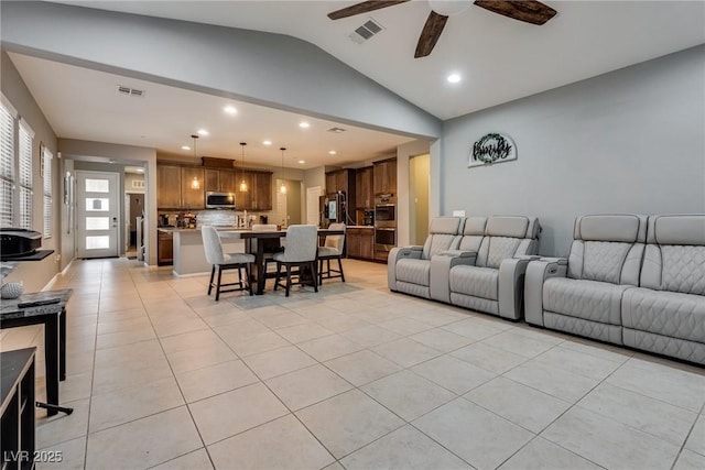 253 Kindly Way, Henderson, NV 89011 - living area with lofted ceiling, a ceiling fan, light tile patterned flooring, and recessed lighting