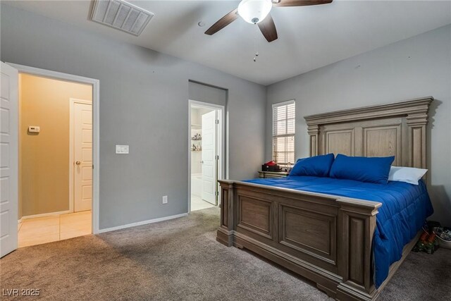 253 Kindly Way, Henderson, NV 89011 - bedroom featuring carpet flooring, baseboards, connected bathroom, and ceiling fan