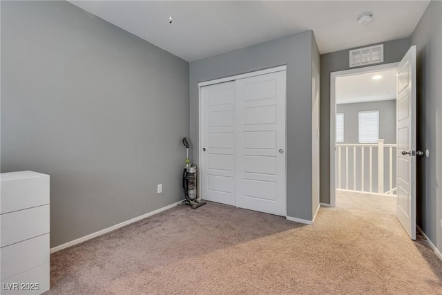 253 Kindly Way, Henderson, NV 89011 - unfurnished bedroom featuring carpet flooring, a closet, and baseboards