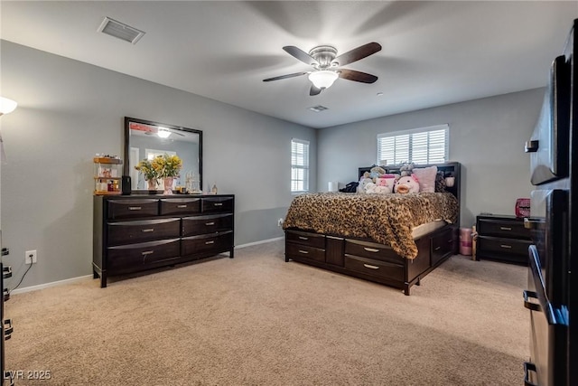 253 Kindly Way, Henderson, NV 89011 - bedroom with light carpet, baseboards, and ceiling fan