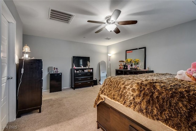 253 Kindly Way, Henderson, NV 89011 - bedroom featuring light colored carpet, ceiling fan, and arched walkways