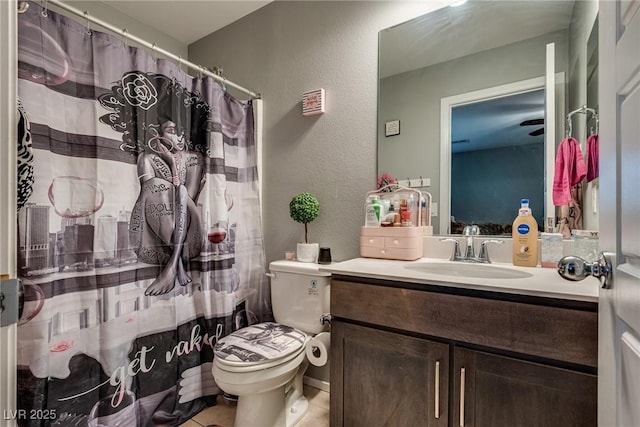 253 Kindly Way, Henderson, NV 89011 - bathroom featuring toilet, vanity, tile patterned floors, and a textured wall