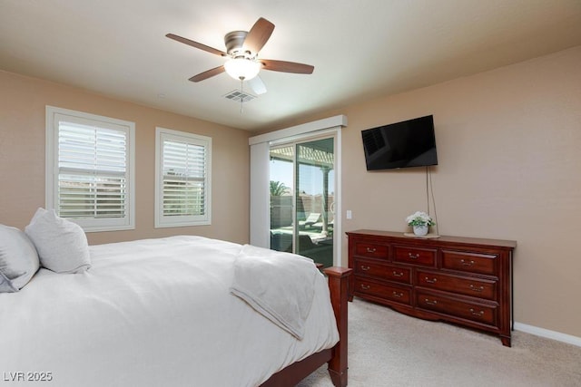 bedroom featuring access to exterior, light carpet, ceiling fan, and baseboards
