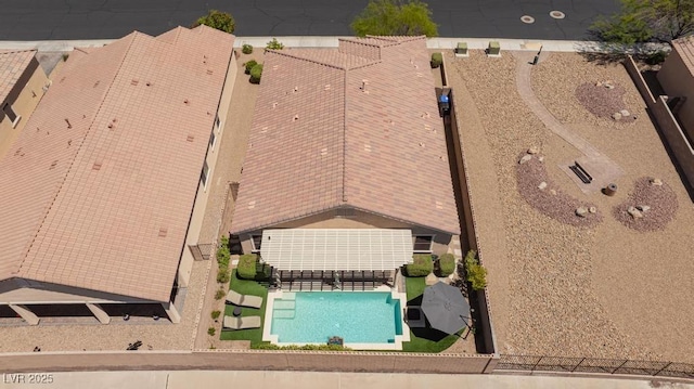view from above of property with a pool area
