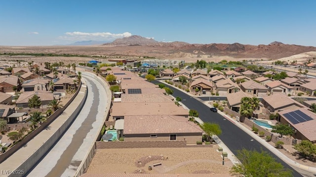 aerial perspective of suburban area featuring a mountainous background