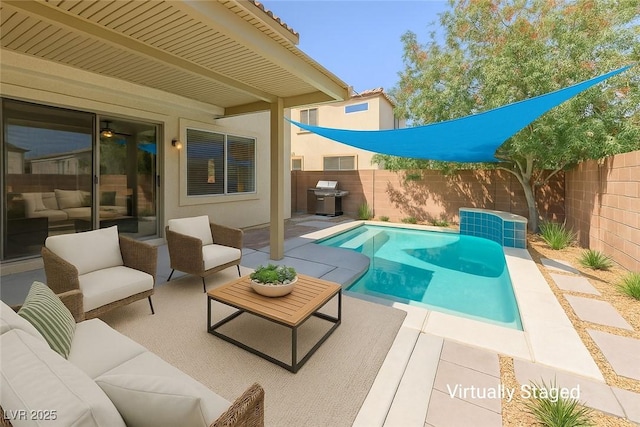 3440 Bella Viera Ct, Las Vegas, NV 89141 - view of pool with an outdoor hangout area, a patio, a fenced backyard, and a grill