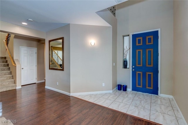 3440 Bella Viera Ct, Las Vegas, NV 89141 - foyer with stairs, baseboards, and wood finished floors