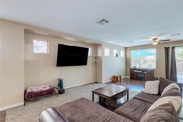 3440 Bella Viera Ct, Las Vegas, NV 89141 - carpeted living area with baseboards and a ceiling fan