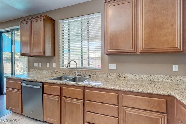 3440 Bella Viera Ct, Las Vegas, NV 89141 - kitchen featuring dishwasher, a sink, and light stone countertops