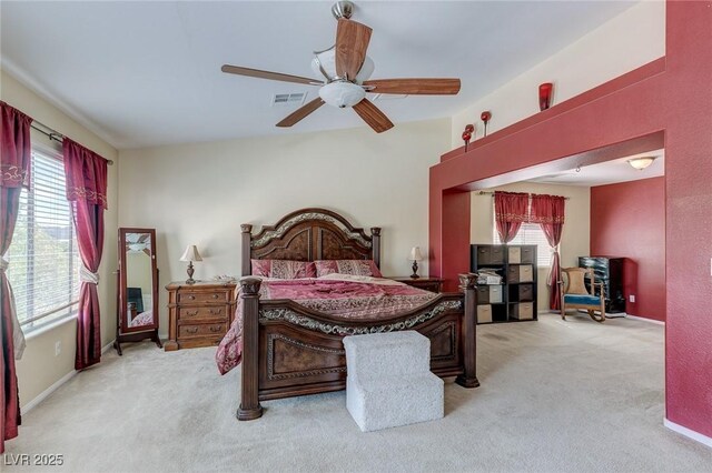 3440 Bella Viera Ct, Las Vegas, NV 89141 - bedroom with carpet floors, multiple windows, and a ceiling fan