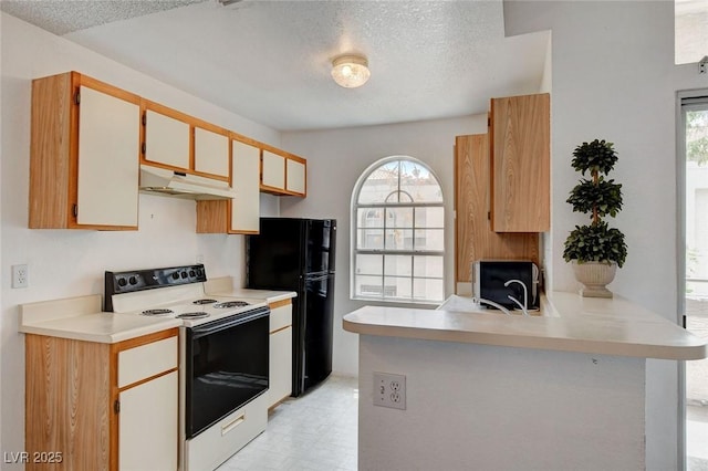 kitchen with white electric stove, under cabinet range hood, a textured ceiling, a peninsula, and light countertops