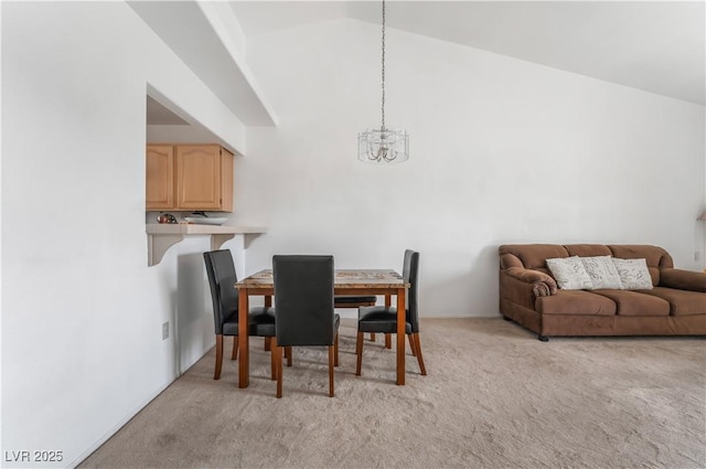 2851 S Valley View Blvd Unit 2148, Las Vegas, NV 89102 - dining space featuring light colored carpet, a chandelier, and vaulted ceiling