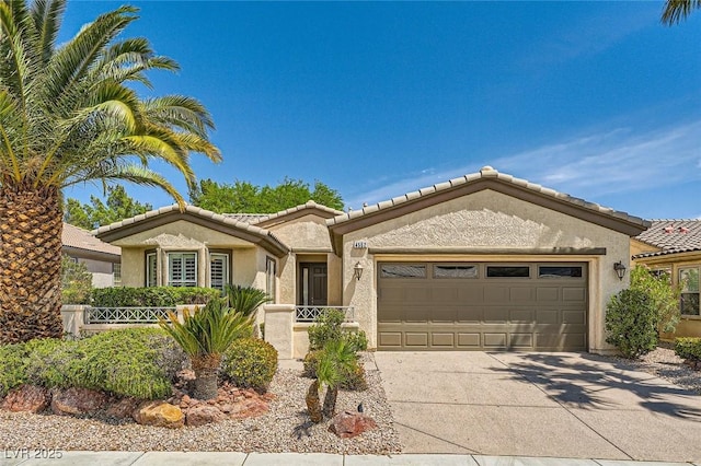 4552 Largo Cantata St, Las Vegas, NV 89135 - single story home featuring driveway, a garage, stucco siding, fence, and a tile roof