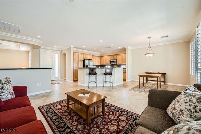 4552 Largo Cantata St, Las Vegas, NV 89135 - living room with arched walkways, recessed lighting, ornamental molding, and baseboards