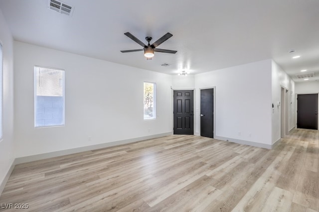 7849 Montour Falls St, Las Vegas, NV 89149 - empty room with light wood-style floors, a ceiling fan, and baseboards