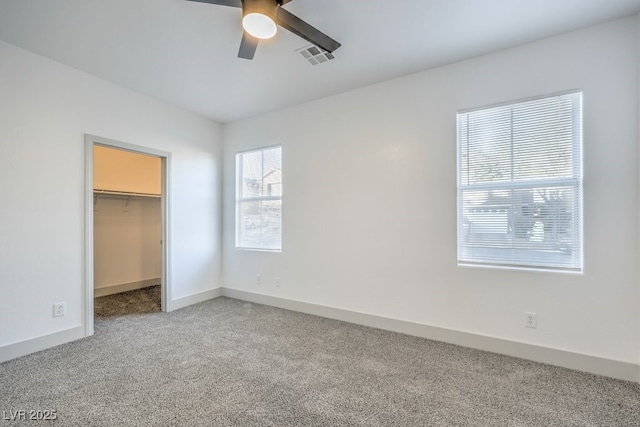 7849 Montour Falls St, Las Vegas, NV 89149 - unfurnished bedroom featuring carpet, a walk in closet, a closet, and baseboards