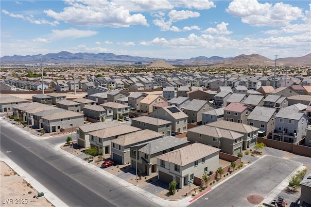 aerial view of residential area with mountains