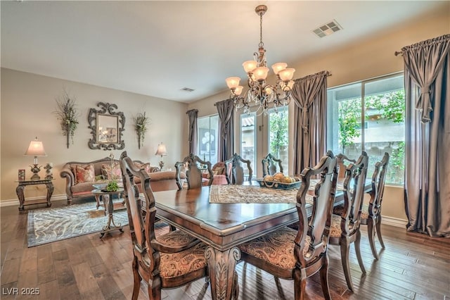 4419 Via Bianca Ave, Las Vegas, NV 89141 - dining room with a chandelier, healthy amount of natural light, and baseboards