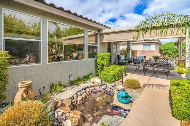 4419 Via Bianca Ave, Las Vegas, NV 89141 - rear view of house with a patio, fence, and stucco siding