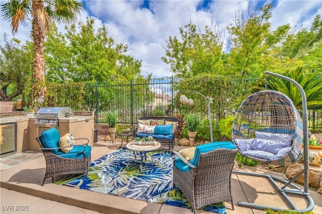 4419 Via Bianca Ave, Las Vegas, NV 89141 - view of patio with area for grilling, an outdoor living space, exterior kitchen, and fence