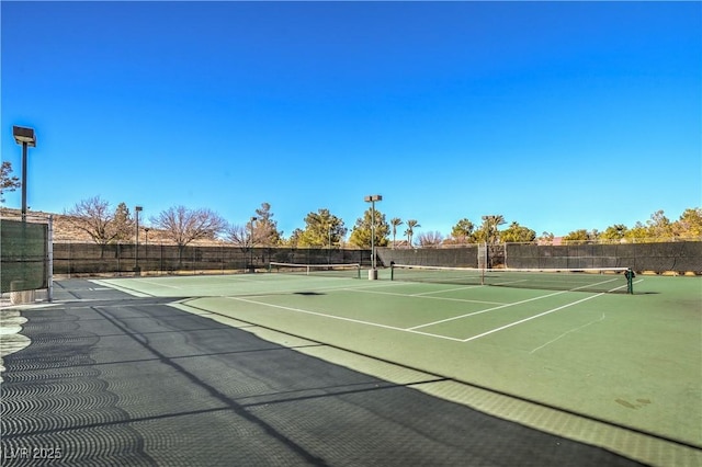 4419 Via Bianca Ave, Las Vegas, NV 89141 - view of tennis court featuring fence and community basketball court