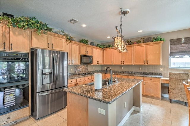 4419 Via Bianca Ave, Las Vegas, NV 89141 - kitchen featuring black appliances, a sink, light tile patterned flooring, dark stone countertops, and backsplash