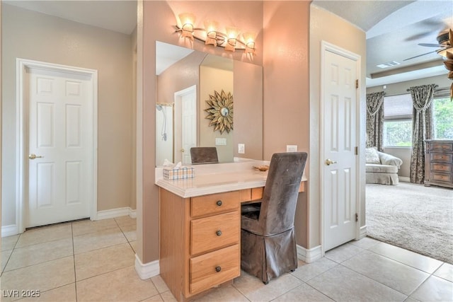 4419 Via Bianca Ave, Las Vegas, NV 89141 - home office with light tile patterned flooring, baseboards, light carpet, and ceiling fan