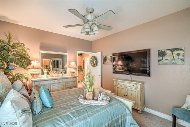 4419 Via Bianca Ave, Las Vegas, NV 89141 - bedroom with light carpet, baseboards, and ceiling fan