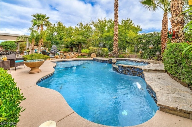 4419 Via Bianca Ave, Las Vegas, NV 89141 - view of swimming pool featuring a patio, fence, and a pool with connected hot tub
