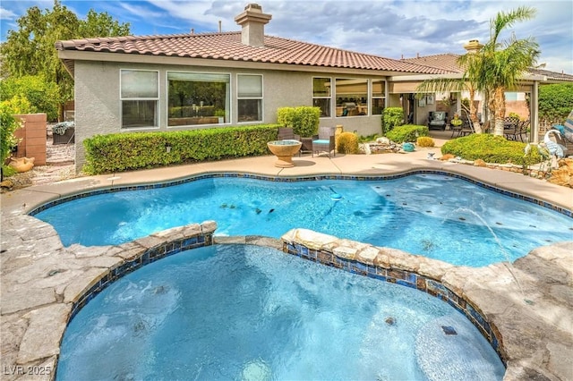 4419 Via Bianca Ave, Las Vegas, NV 89141 - view of pool featuring a patio and a pool with connected hot tub