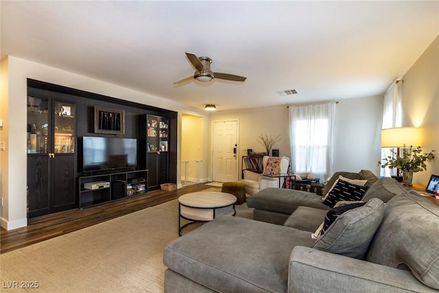 9925 Turquoise Glass Ct, Las Vegas, NV 89178 - living room featuring ceiling fan, wood finished floors, and baseboards