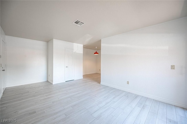 2606 S Durango Dr Unit 122, Las Vegas, NV 89117 - unfurnished room with light wood-style flooring and baseboards