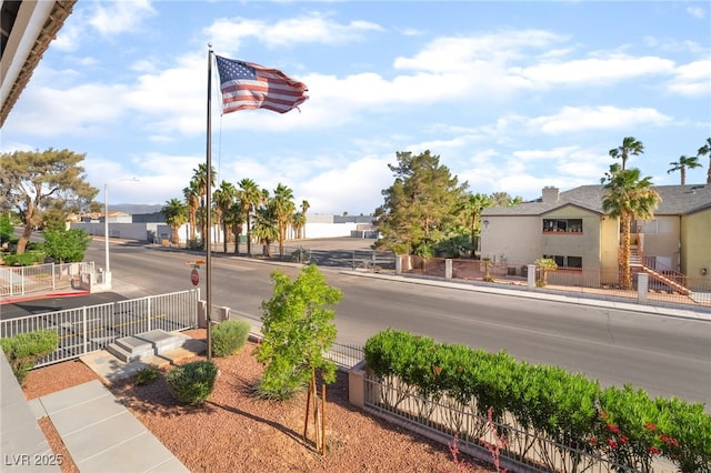 611 Bass Dr Unit C, Henderson, NV 89014 - view of asphalt street with sidewalks, street lighting, and curbs