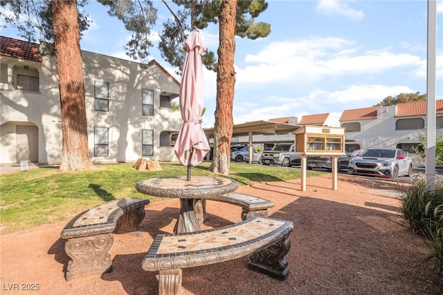 611 Bass Dr Unit C, Henderson, NV 89014 - view of property's community featuring uncovered parking, a yard, and a residential view